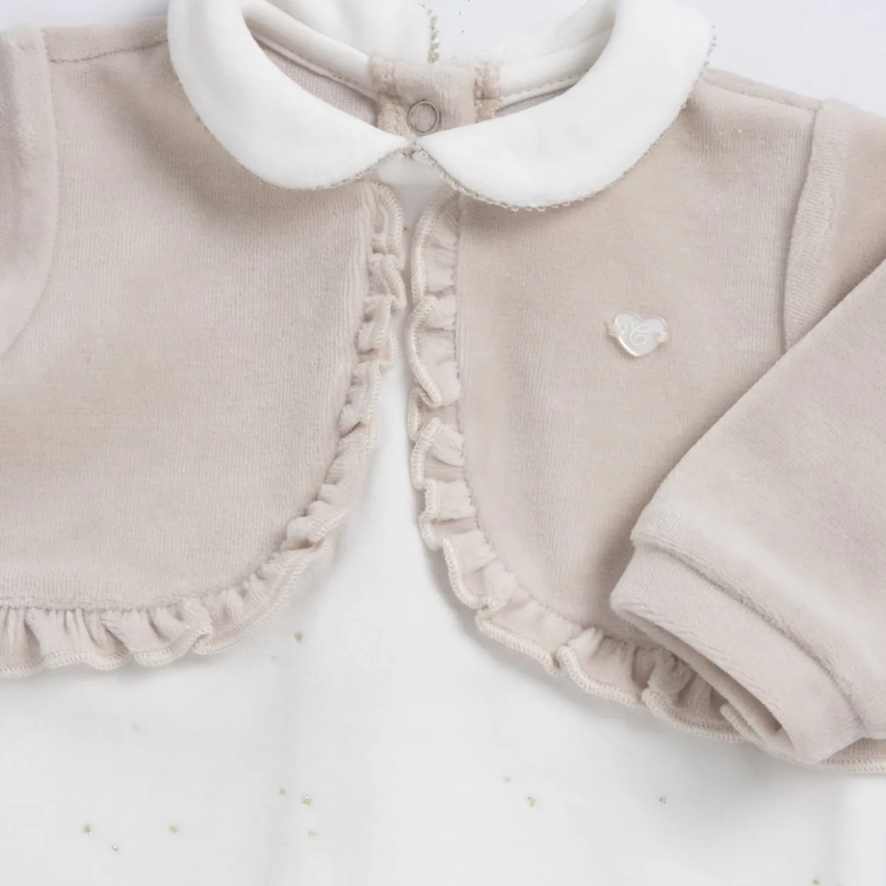 Completo maglia e pantaloni con piedini