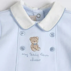 Completo maglia e pantaloni con piedini
