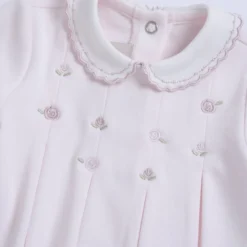Completo maglia e pantaloni con piedini