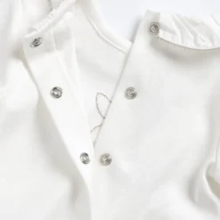 Completo maglia e pantaloni con piedini
