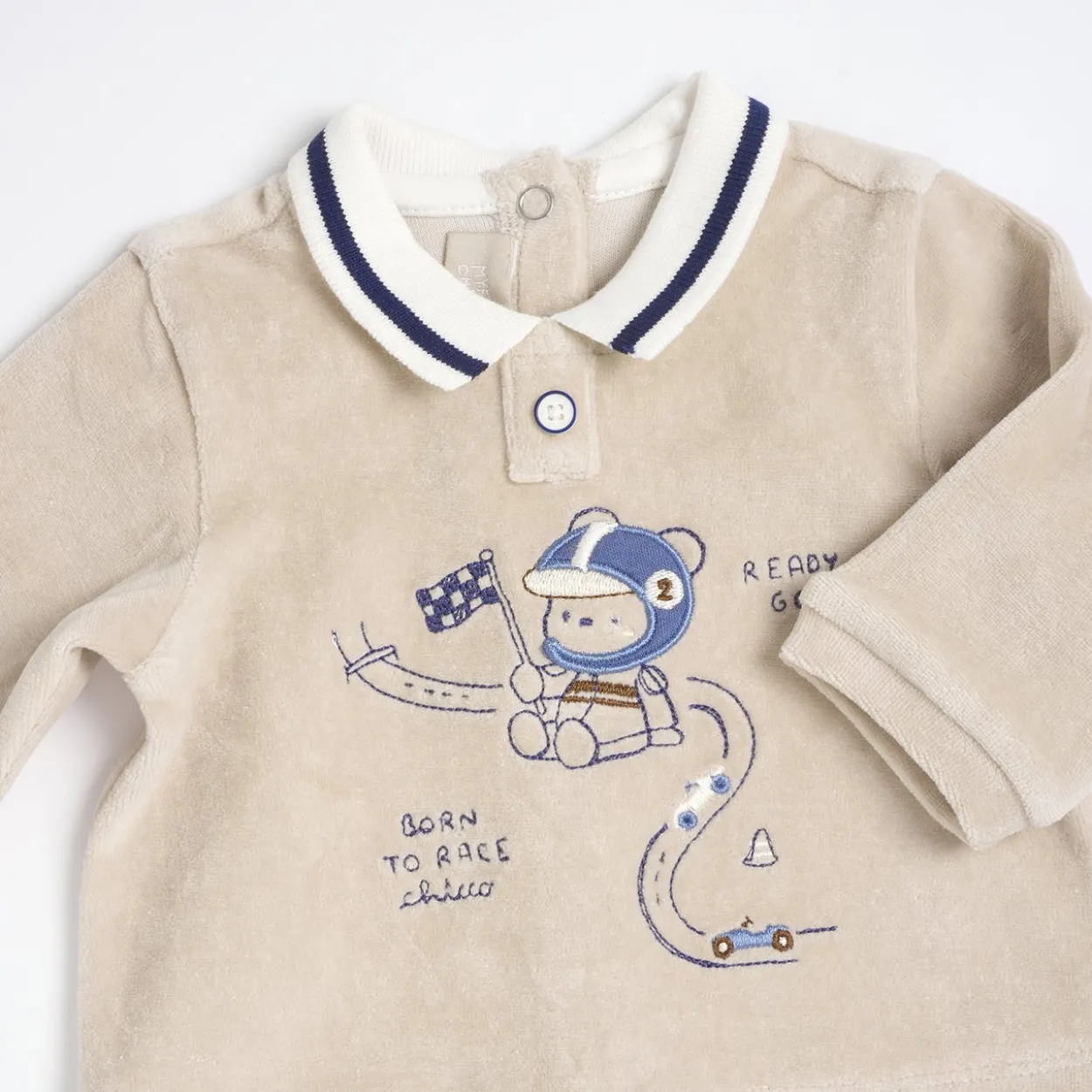 Completo maglia e pantaloni con piedini