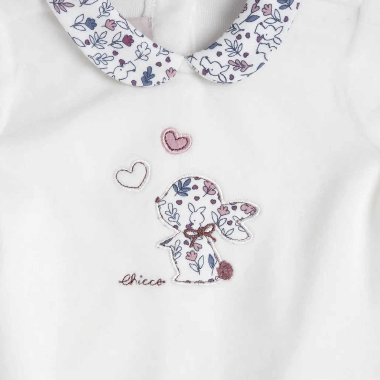 Completo maglia e pantaloni con piedini