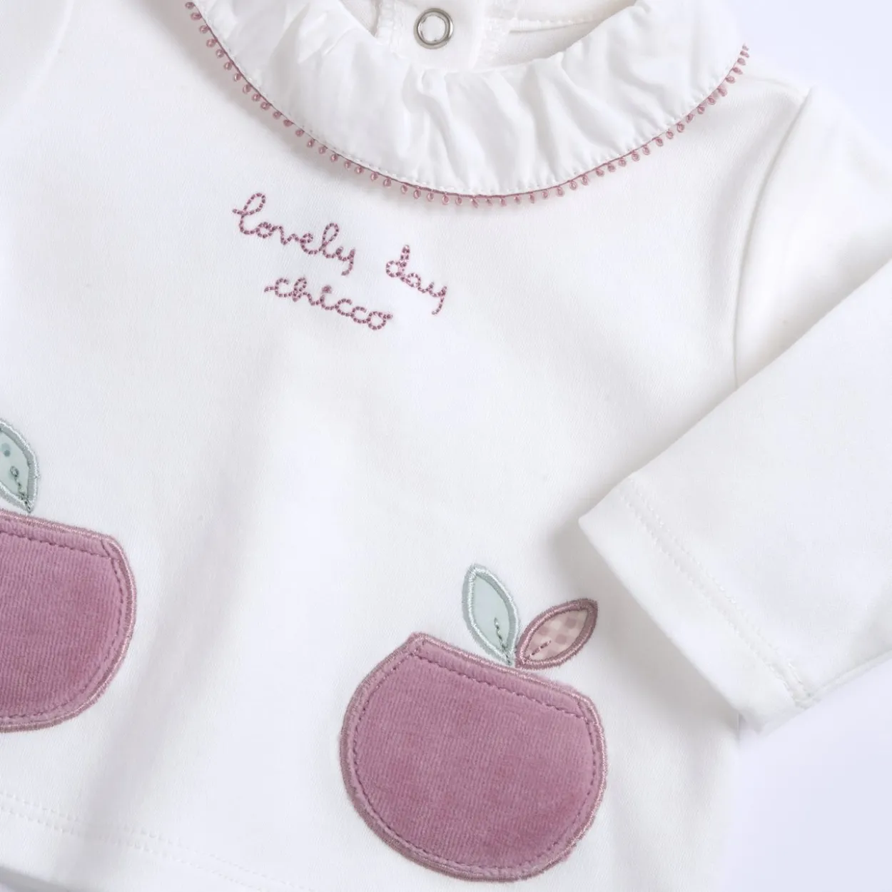 Completo maglia e pantaloni con piedini