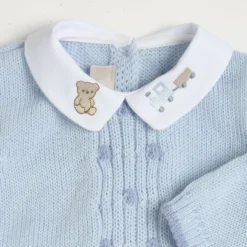 Completo maglia e pantaloni con piedini
