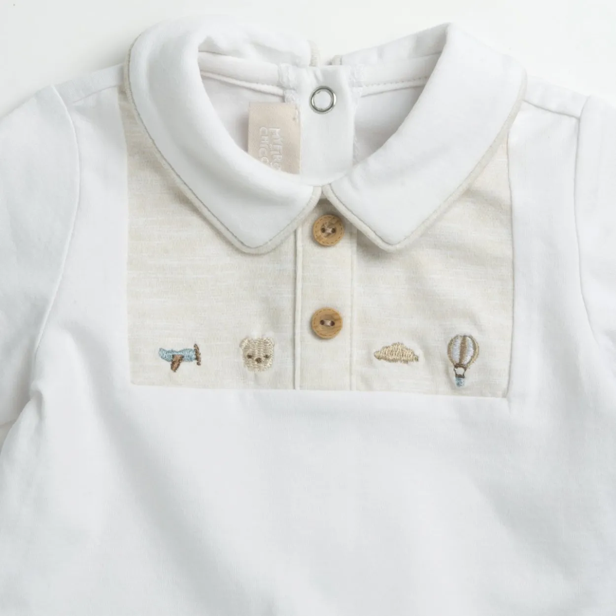 Completo maglia e pantaloni con piedini